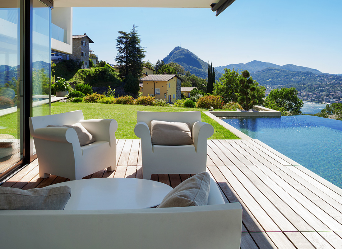 Personal Insurance - High End Home With Pool in the Mountains on a Sunny Day